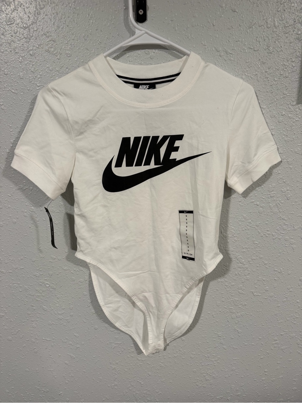 Nike White Bodysuit with Black Swoosh Logo size small NWT